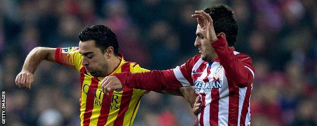 Koke and Xavi