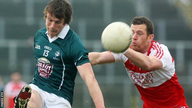 Patsy Bradley attempts to block at Padraig Brophy shot