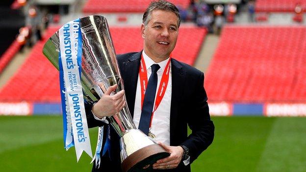 Peterborough United manager Darren Ferguson holds the Johnstone's Paint Trophy