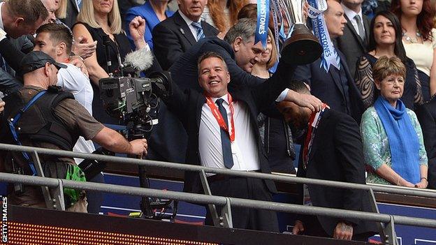 Peterborough United manager Darren Ferguson holds the Johnstone's Paint Trophy