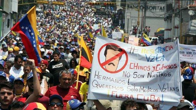 Opposition activists march in San Cristobal on 5 March, 2014