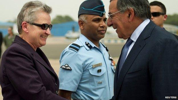 US Defence Secretary Leon Panetta (R) shakes hands with US ambassador to India Nancy Powell upon his arrival in New Delhi in this 5 June 2012