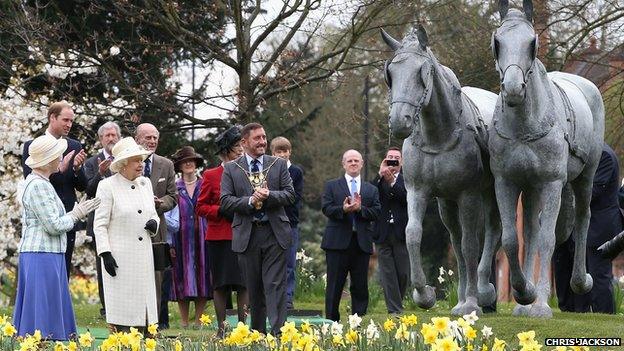 The Queen, Prince Philip and Prince William with the life-sized horse sculpture in Windsor