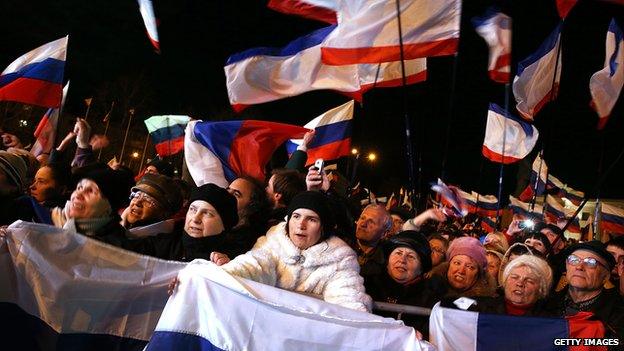 People in Simferopol, Ukraine attend a pro-Russian rally on March 16, 2014