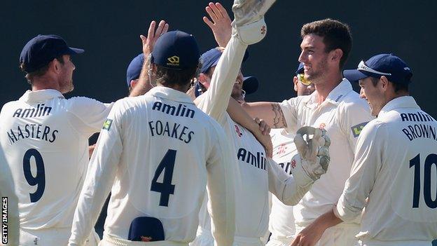 Essex players celebrate a wicket