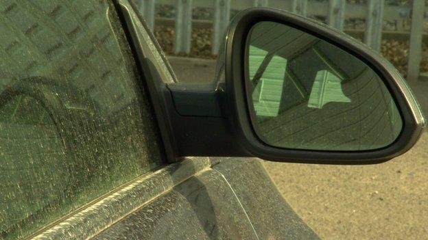 Pollution dust on a car