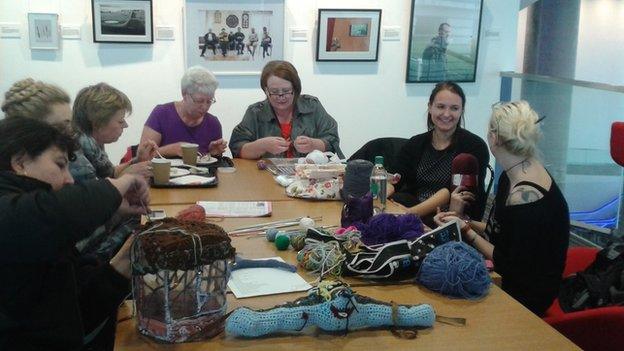 Women attending a knitting session