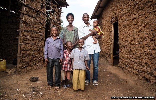 Jean-Baptiste, 34, with his family