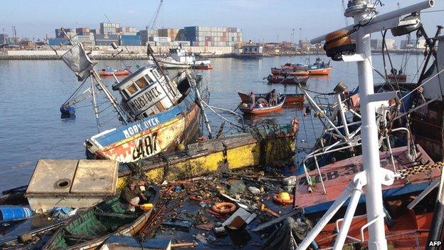 Sunken fishing boats in Iquique, northern Chile, on 2 April 2014