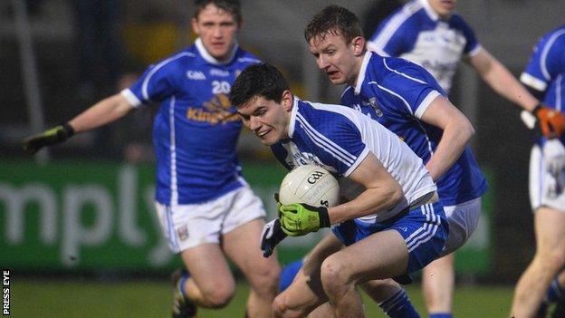 Monaghan's Brian Greenan in action against Brian Sankey of Cavan