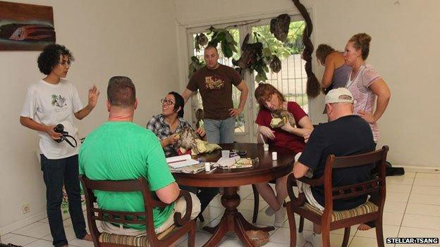 volunteers around a table