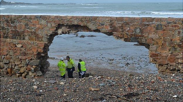 Arch created in the Vazon sea wall by winter storms