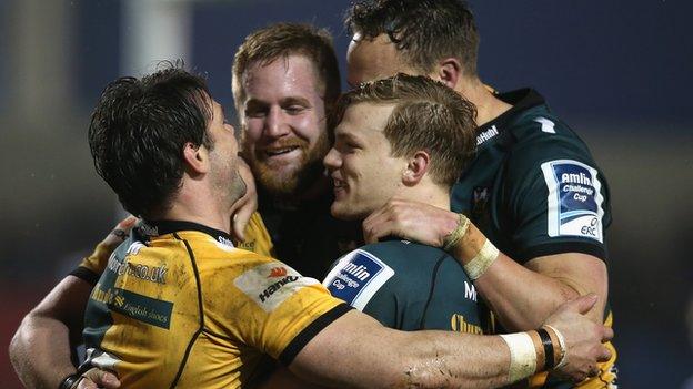 Northampton Saints celebrate a Ben Foden try against Sale Sharks