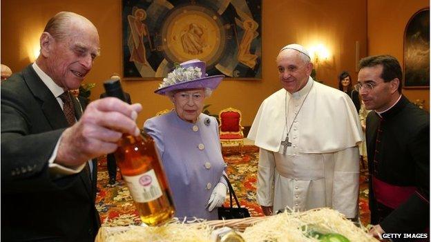 Prince Philip, the Queen and the Pope in a room known as the "Pope's study"