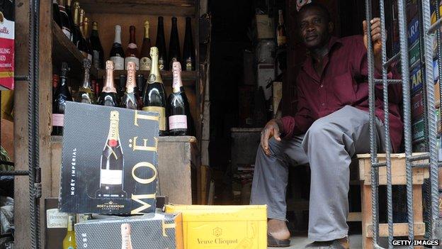 Champagne bottles displayed at a roadside shop in Lagos in April 2013