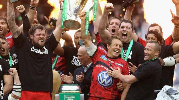 Jonny Wilkinson (second from right in front row lifting trophy) and his team-mates lift the Heineken Cup last year