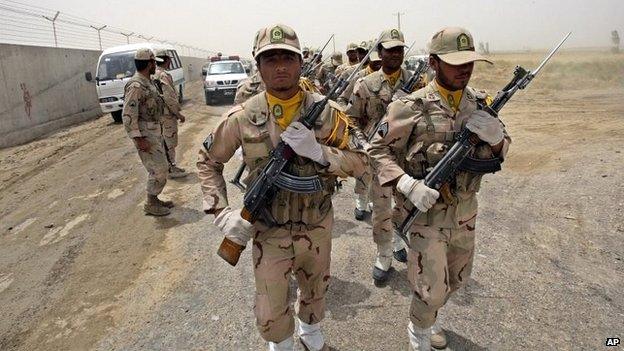 Iranian border guards march near the border with Pakistan and Afghanistan in the Sistan Baluchistan Province