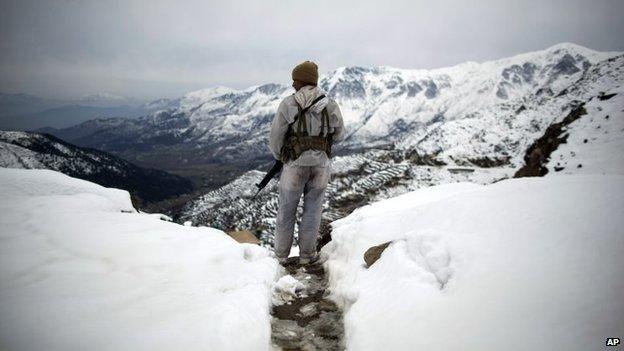 Photo by Anja Niedringhaus of a Pakistani soldier in Dir province on the border with Afghanistan, in February 2012