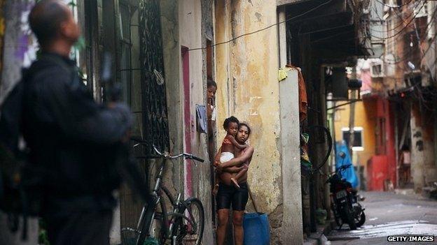 Policeman in the Favela da Mare, Rio, 30 March 2014