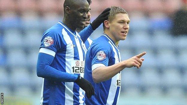 Wigan's Martyn Waghorn (right) celebrates