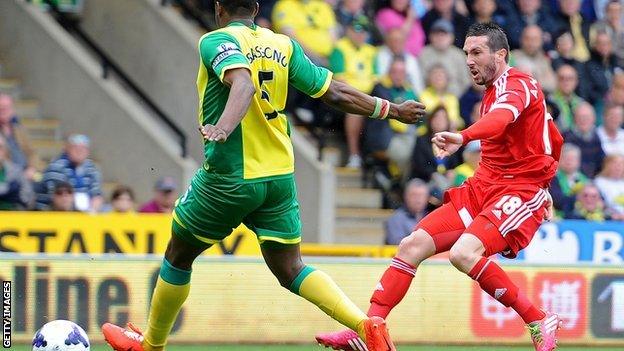 Morgan Amalfitano shoots West Brom into the lead against Norwich