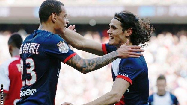 Paris's Dutch defender Gregory Van der Wiel (left) and Paris' Uruguay forward Edinson Cavani