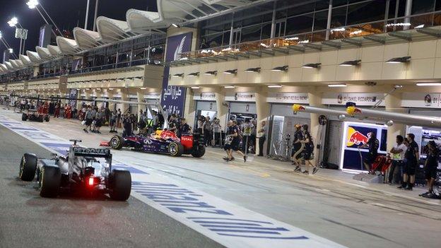 F1 cars at the pit during the Formula 1 Bahrain Grand Prix at the Sakhir circuit in Manama