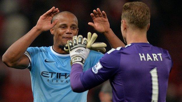 Vincent Kompany and Joe Hart celebrate
