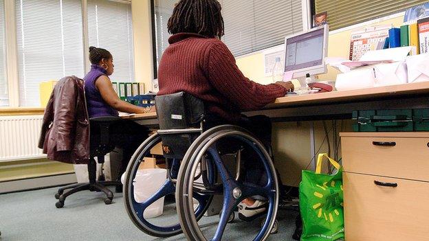 Disabled person working in an office