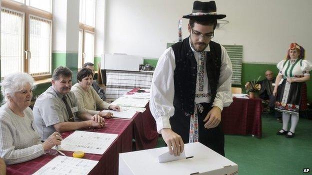 Hungarian voter casts his ballot in Holloko, north of Budapest