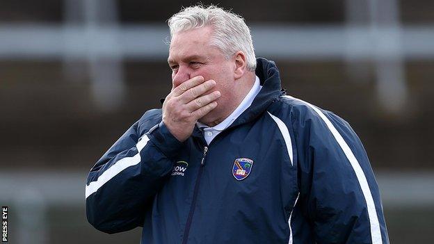 Paul Grimley watches his Armagh side suffering relegation to Division 3 of the Football League