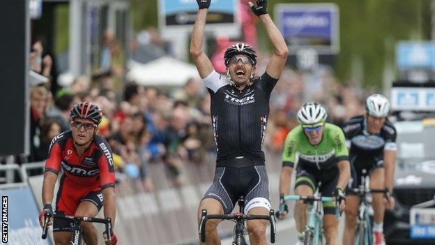 Fabian Cancellara (centre) celebrates winning the Tour of Flanders