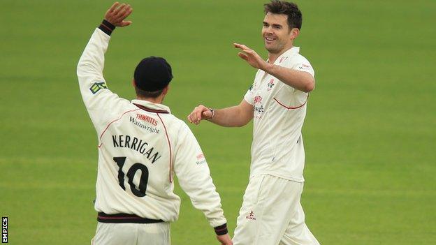 Jimmy Anderson takes a wicket for Lancashire