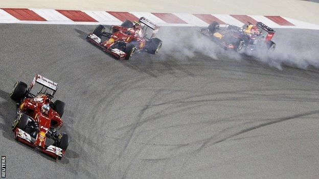 Fernando Alonso leads fellow Ferrari driver Kimi Raikkonen at the Bahrain GP