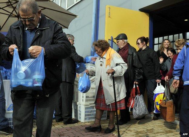 Free food handout for poor people in Athens - file pic