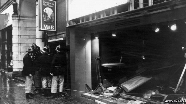 Firefighters outside remains of Tavern in the Town pub