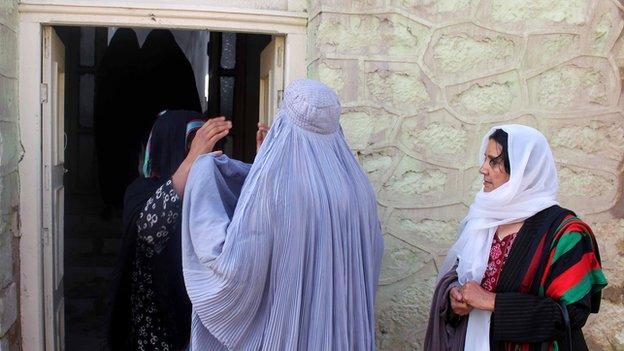 Female security staff were on hand to check female voters at a polling centre in Kandahar