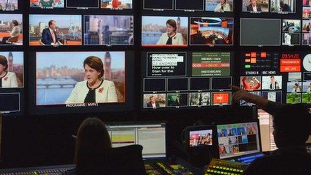 TV screens showing interview with Maria Miller in 2013