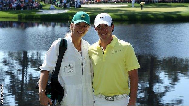 Rory McIlroy and fiancee Caroline Wozniacki smile together during the 2013 Par Three tournament