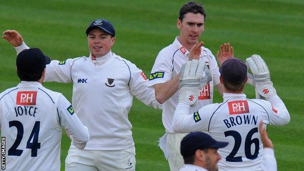 Steve Magoffin celebrates with his Sussex team-mates