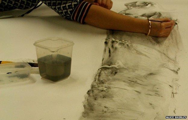 A life-size drawing of the giant squid specimen in the NHM collection, painted in fresh squid ink