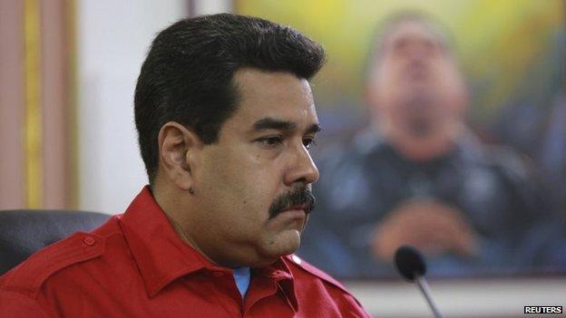 Venezuela's President Nicolas Maduro pauses during a meeting on social movements at Miraflores Palace in Caracas on 7 April, 2014