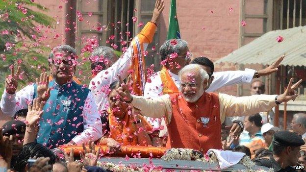 In this photograph taken on April 9, 2014, Narendra Modi (C) in Vadodara to file his nomination papers