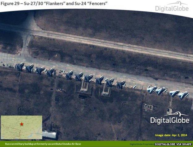 Satellite image taken on 2 April 2014, shows what appears to be Russian Su-27/30 Flankers and Su-24 Fencers at the formerly vacant Buturlinovka Air Base in Russia