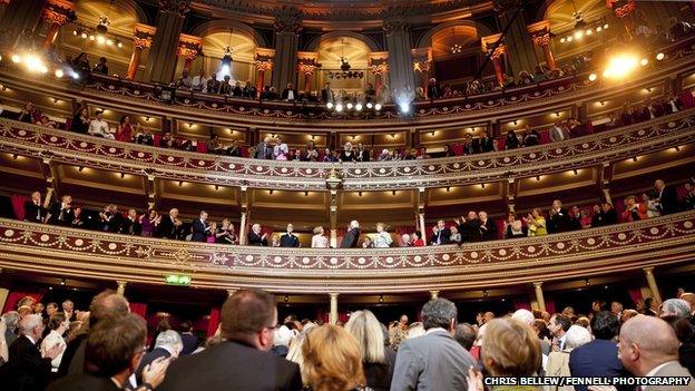 Mr Higgins and his wife were applauded as they entered the Royal Albert Hall