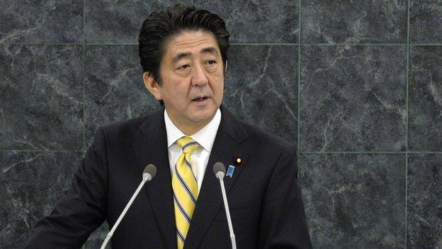 Japan's Prime Minister Shinzo Abe addresses a High-Level Meeting on Nuclear Disarmament during the 68th United Nations General Assembly at U.N. headquarters on 26 September, 2013 in New York City