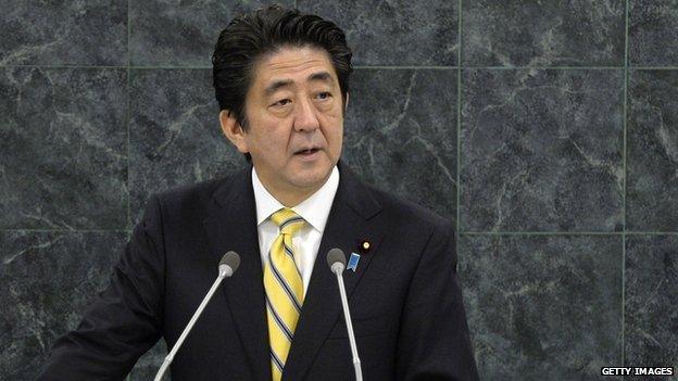 Japan's Prime Minister Shinzo Abe addresses a High-Level Meeting on Nuclear Disarmament during the 68th United Nations General Assembly at U.N. headquarters on 26 September, 2013 in New York City