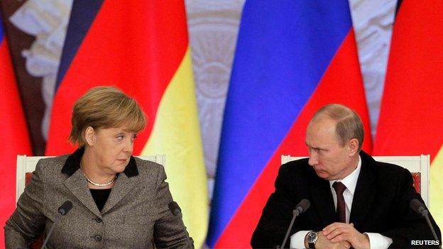 File photo of German Chancellor Angela Merkel and Russian President Vladimir Putin