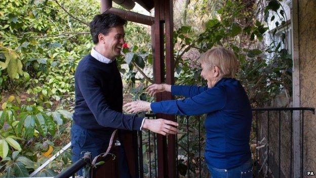 Ed Miliband is greeted by the outstretched arms of his mother's cousin Sara