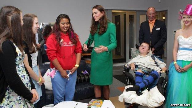 The Duchess of Cambridge talking to youngsters